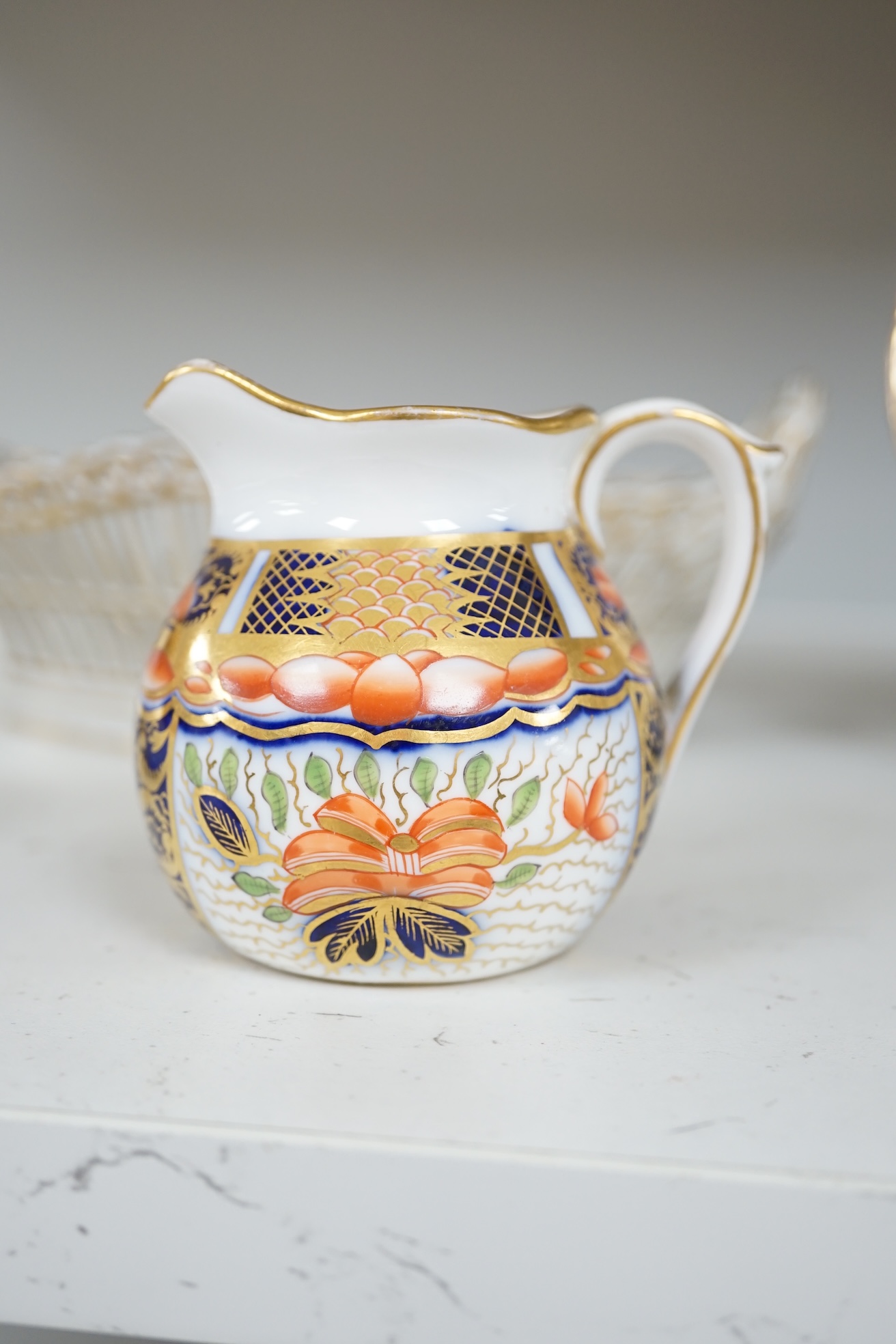 Three Imari pattern ceramic pots, a Crook’s pierced floral decorated plate, diameter 21cm, a pierced Dresden basket, and a small dish. Condition - fair to good.